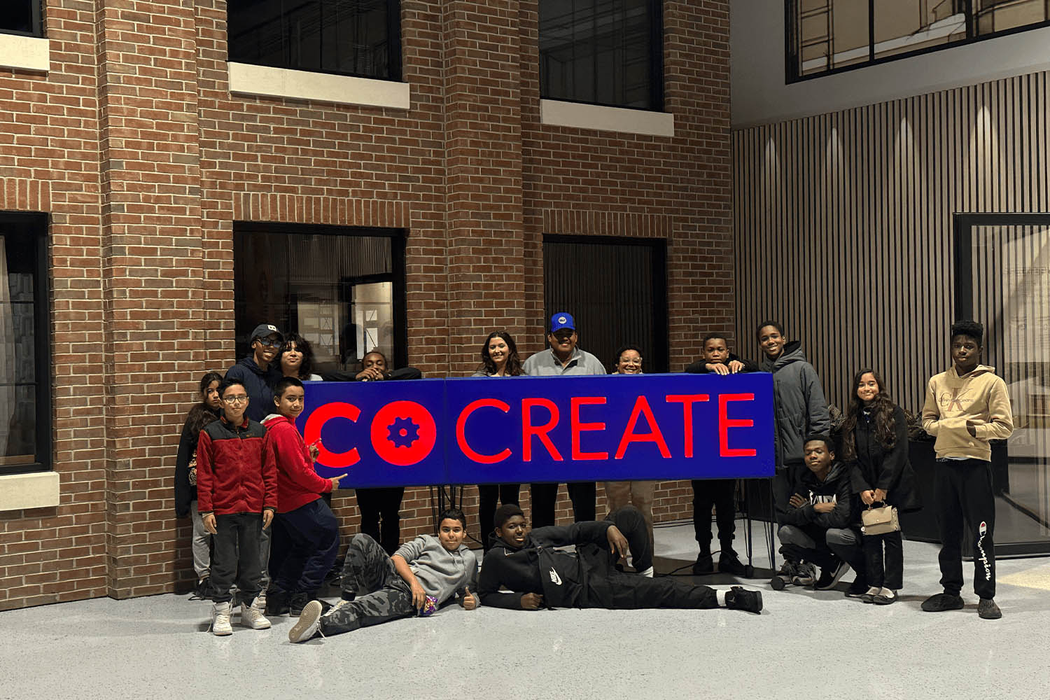 CoCreate Sign with Boys and Girls Club of Stamford members